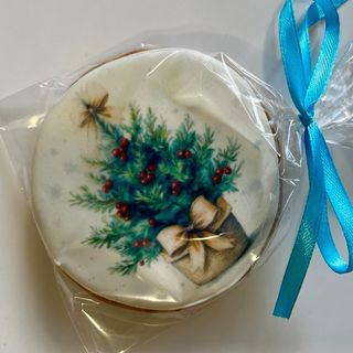 Okrugli medenjak sa novogodišnjim dekorom u pojedinačnom pakovanju