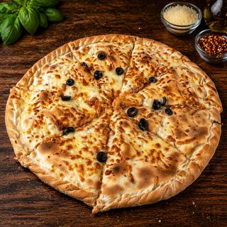 Pizza Spéciale Escalope (Double Pâte)
