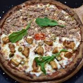 Pizza El Khomsa
