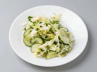 Салат з капусти молодої та огірка (100г)
