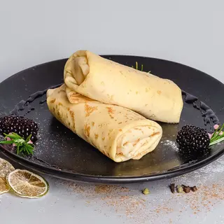Млинці з пасерованими яблуками (320г)
