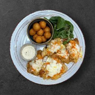 Філе мерлузи з овочами та крокетами