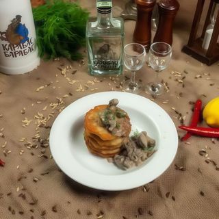 Деруни з грибним соусом (240/100г)