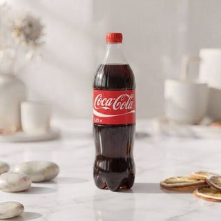 Напій Coca-Cola  1.25 л