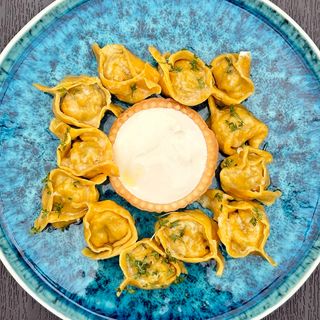 Пельмені фірмові з м'ясом свинини 