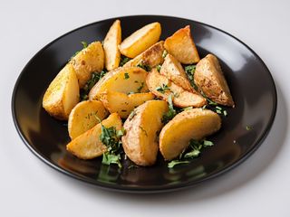 Картопля по-селянськи з печерицями та цибулею (180г)