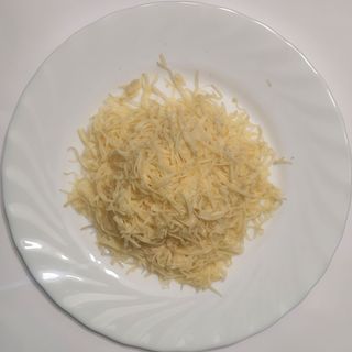 Сир твердий тертий (50г)