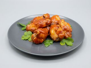 Крильця курячі в пікантному соусі (300г)