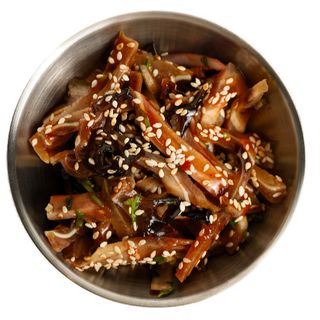 Свинячі вушка в соусі кімчі  (100г)