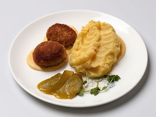 Картопляне пюре з курячими котлетами під сирним соусом (350г)