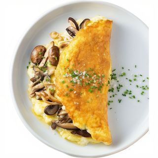 Деруни з куркою та сирним соусом 250г