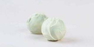 Цукерка фісташкова в білому шоколаді