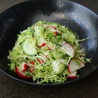 Салат з молодої капусти (200г)