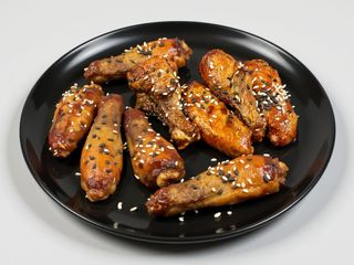 Крильця у медово- томатному соусі 