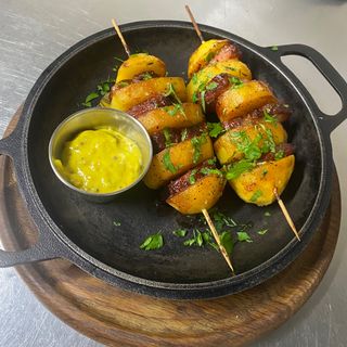 Запечене картопля з копченим беконом