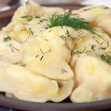 Вареники з  картоплі зі сметаною  (200/50г) 