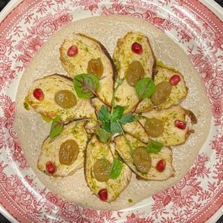 Сациві з курча та копченим виноградом