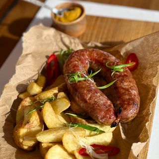 Запечена ковбаса з картопляними дольками(400гр)