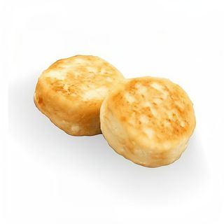 Рум'яні сирники з родзинками 