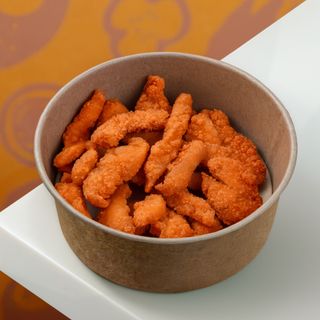 Курячі стріпси з кисло-солодким соусом (150/30г)