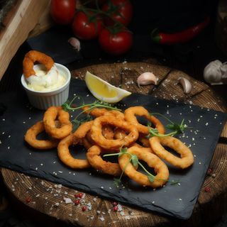 Кільця з цибулі смажені у клярі