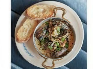 Печені морепродукти в соусі горгонзола