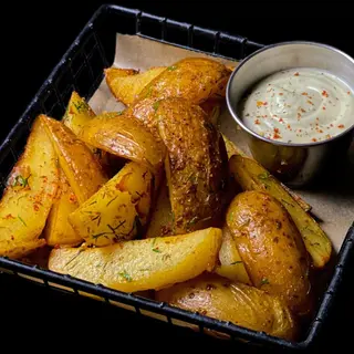 Картопля по селянськи + соус часниковий ( 230 гр)