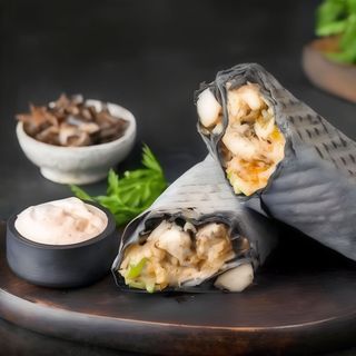 Шаурма в чорному лаваші з картоплею фрі