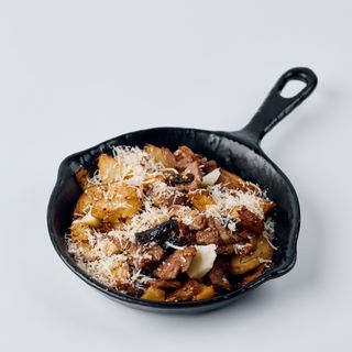 Картопля запечена зі свининою, чорносливом та яблуком (340 г)