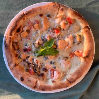 Піца з морепродуктами (500г)