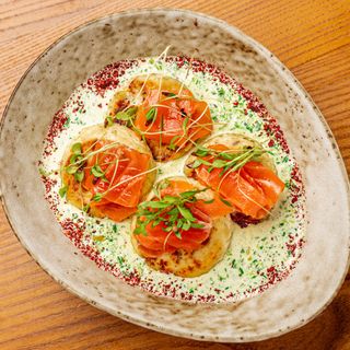 Сирники у шпинатно-сирному соусі