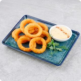 Цибулеві кільця з часниковим соусом (130/50г)