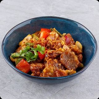 Свинина у кисло-солодкому соусі