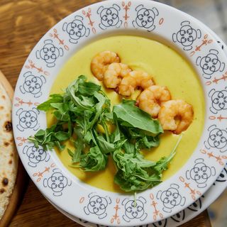 Гарбузовий крем-суп з тигровими креветками