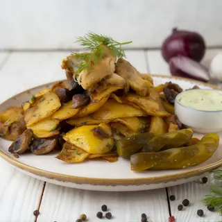 Пательня з курочкою та грибами(500грам)