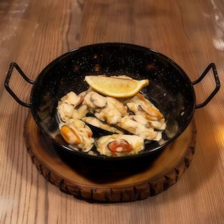 Мідії чорноморські в соусі Чізай фаршировані рисом (460г)