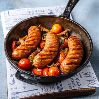 Ковбаски, запечені з овочами