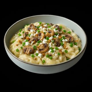 Вареники в сирно-грибному соусі