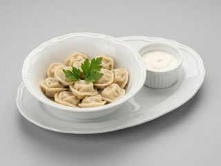 Пельмені з соусом (250г)