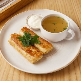 Млинці з м’ясом та курячим бульйоном