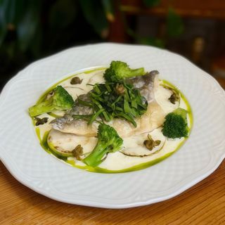 Дорадо з овочами та вершковим соусом