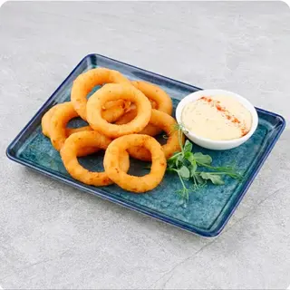 Цибулеві кільця з часниковим соусом (130/50г)