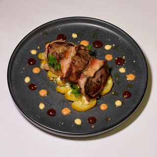 Свинні медальйони в беконі (300г)