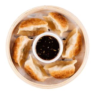 Смажені гьодза з куркою, сиром та грибами