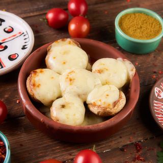 Гриби Печериці в кеці (200г)