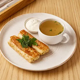 Млинці з м’ясом та курячим бульйоном