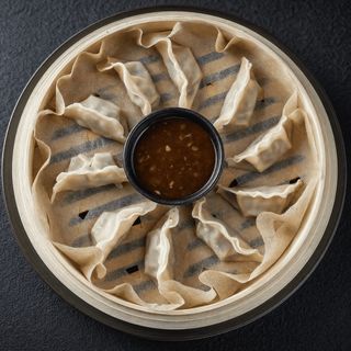 Дамплінги з куркою та соусом (180 г)