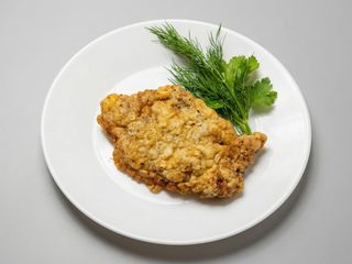 Відбивна зі свинини в клярі (100г)
