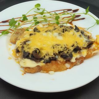 Відбивна куряча з грибами та сиром (200г)