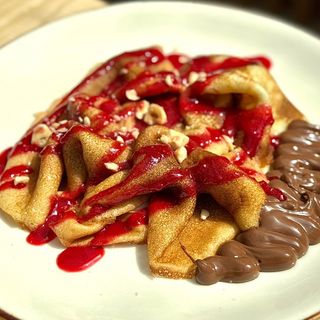 Млинець з шоколадом та малиною(250г)